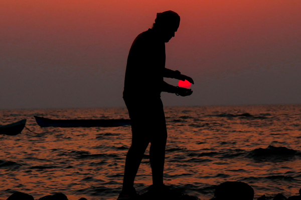 a man on a beach needing social anxiety treatment
